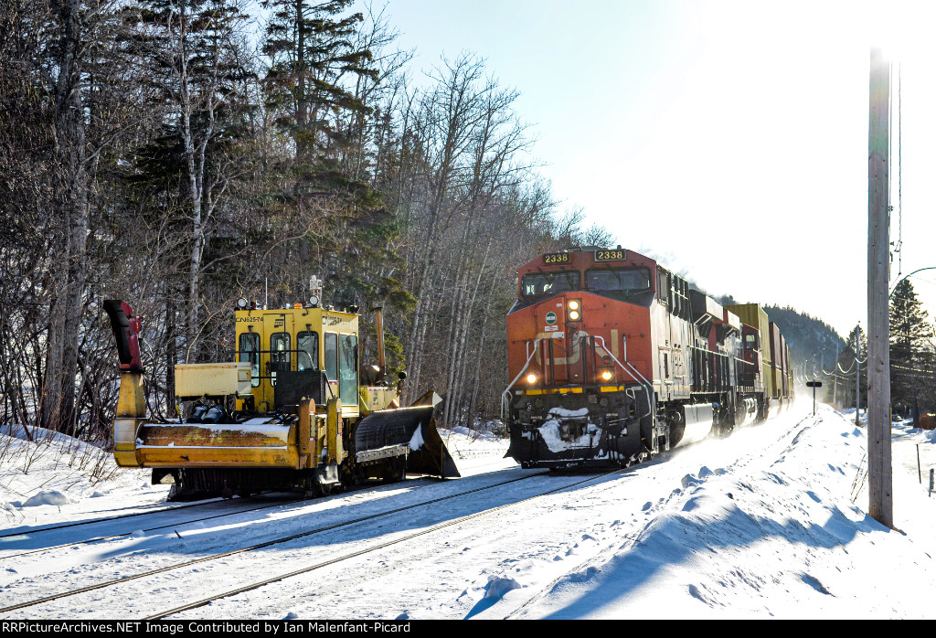 CN 2338 and a piece of snow removal equipment at lAnse Au Sable